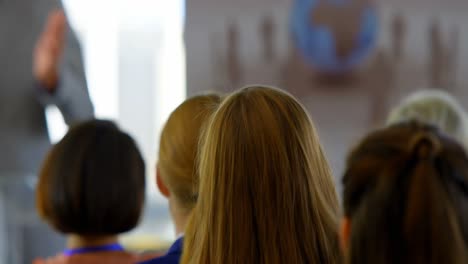 businesswoman raising her hand up in the business seminar 4k