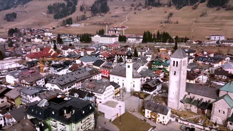 panoramic view of famous hallstatt lakeside town during winter sunrise