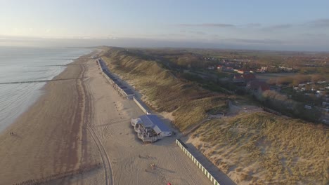 aerial: the beach between vlissingen and dishoek during sunset