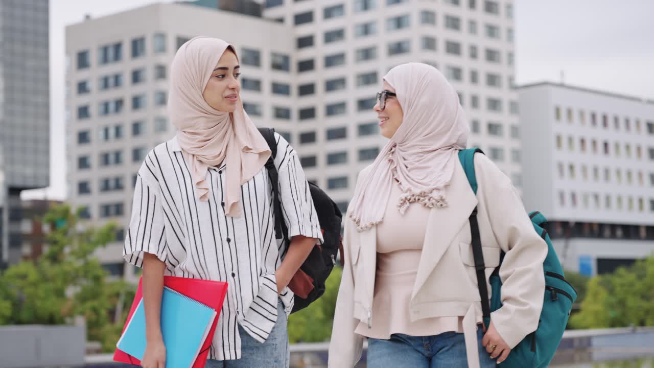 Two Muslim female students on campus