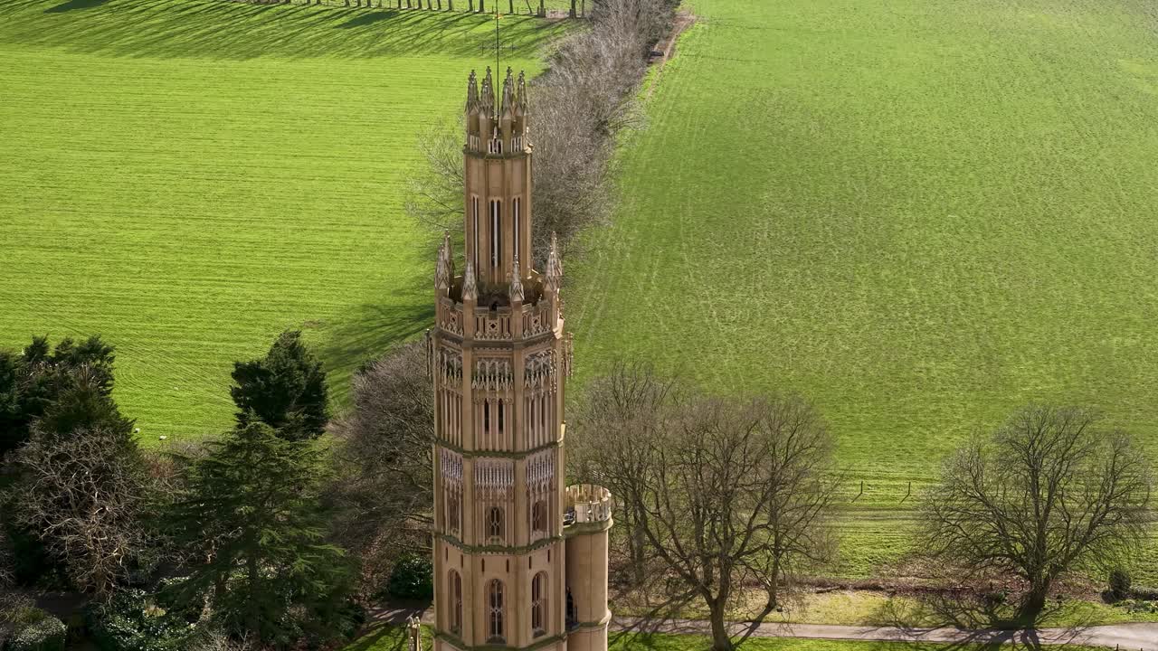 Aerial view of Victorian Gothic Hadlow Tower stands on heritage site in Kent countryside, England