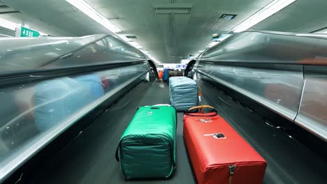 luggage on a conveyor belt at the airport