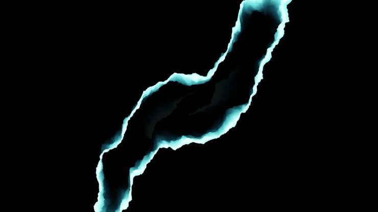 Un impressionante iceberg nero e blu contrasta con le acque scure dell'oceano, mettendo in mostra i suoi sorprendenti spigoli vivi e la sua formazione unica nella vasta distesa del mare.