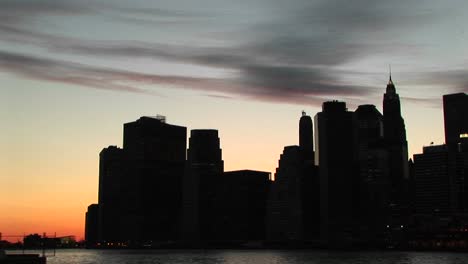 a silhouetted look at new york's skyscrapers at the goldenhour