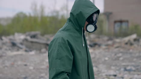 industrial radiation environment pollution. man wearing gas protection suit.