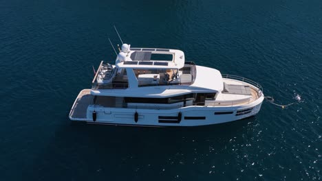 Beautiful-luxury-yacht-on-calm-sea-in-slow-motion-on-a-sunny-day-filmed-by-drone-in-slow-motion