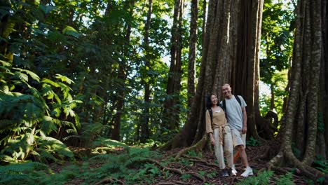 couple hiking in a lush forest