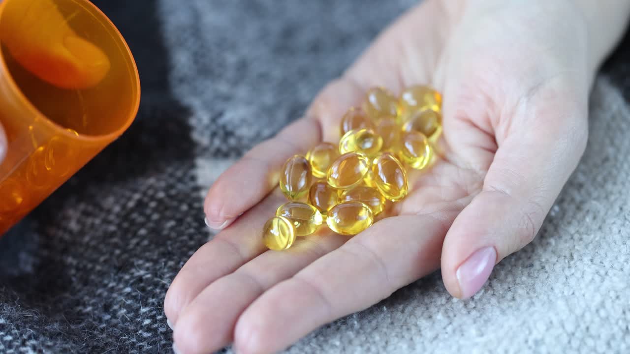 Las píldoras en la mano