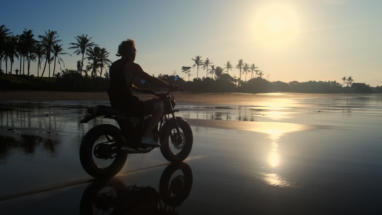 Motorcycle Ride on a Beach Sunrise