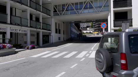 a vehicle passes by a ski school