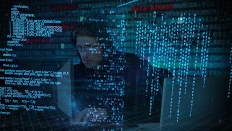 hacker using computer in dark room