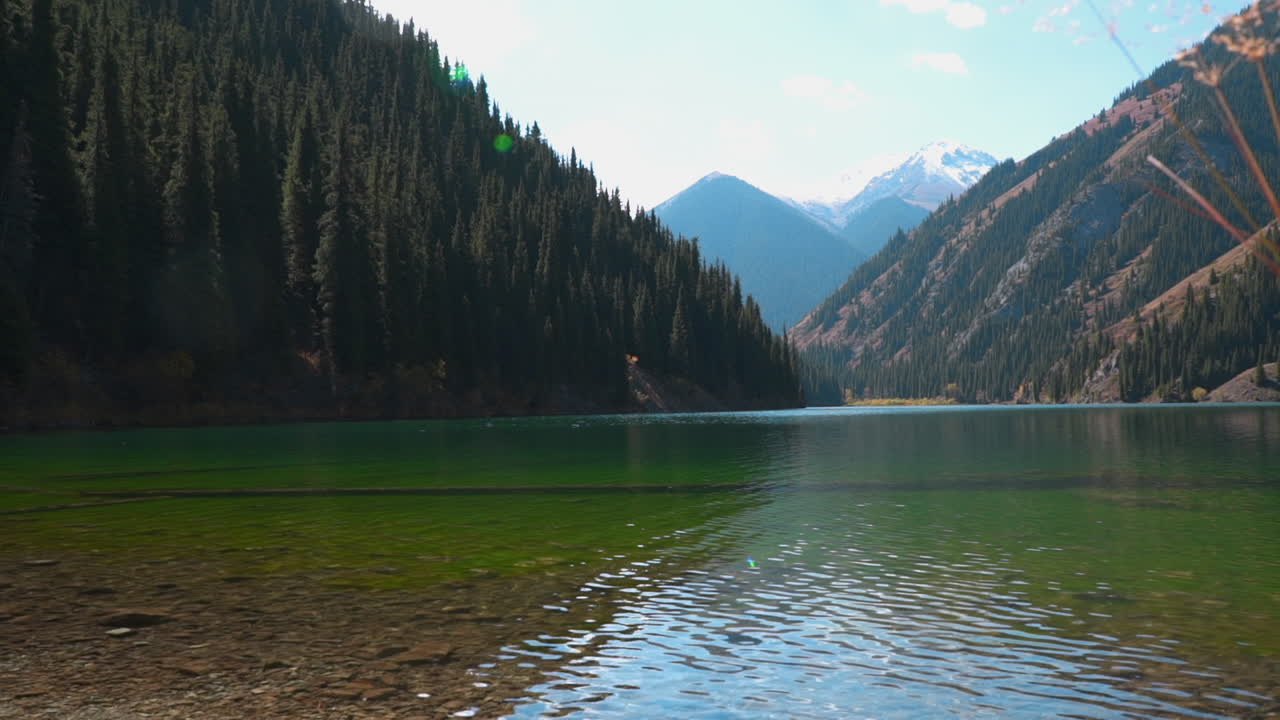 This is a panoramic view of Kolsay Lake in Kazakhstan.