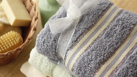 wrapped gift towels with spa accessories