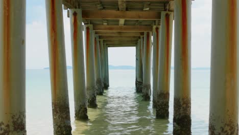 wooden bridge on the beach at dawn in phu quoc island, vietnam