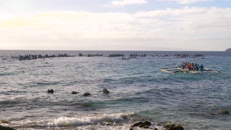 traditional outrigger boats in oslob whale shark watching, cebu philippines. static shot