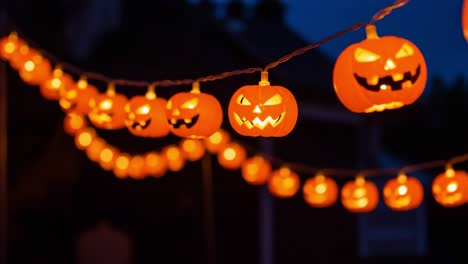 a festive display of illuminated halloween pumpkins, casting a creepy glow in the evening sky, perfect for spooky celebrations and seasonal decor