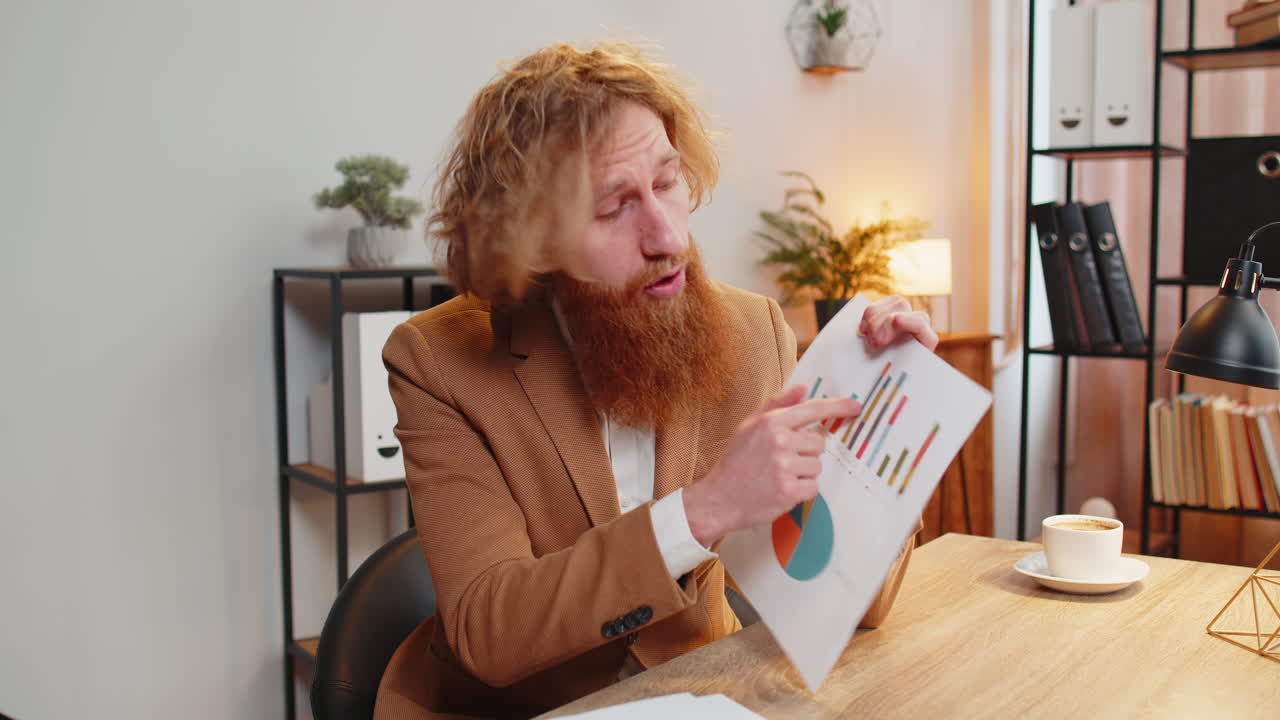 Pov of upset businessman arguing showing report charts and graphs at home office table quarrel