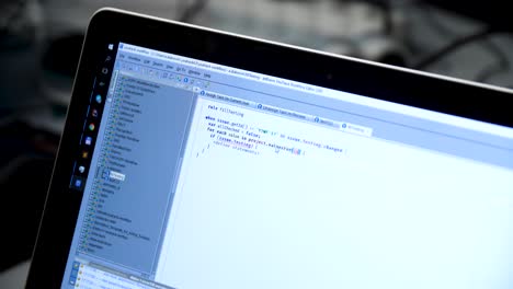 laptop screen showing code editor