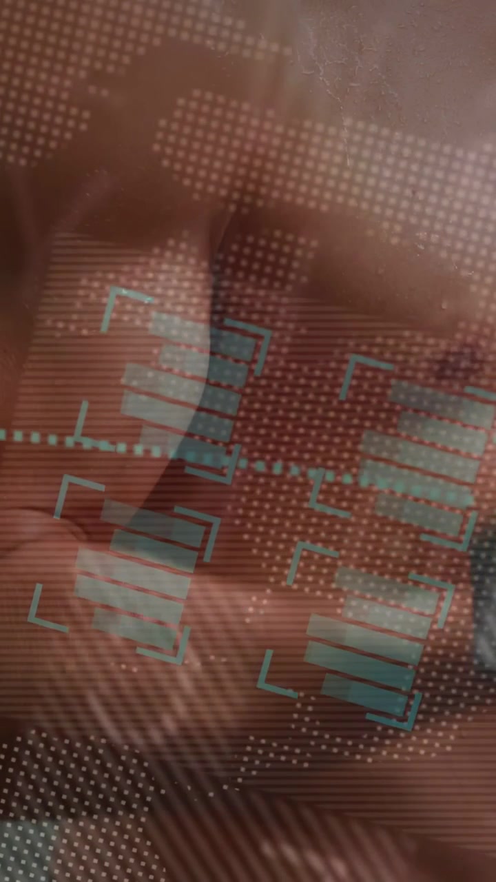 Vertical video: Male subject sliding torso across glass, causing teal bars aligning for health scan