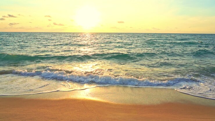 Daybreak on exotic beach with tropical sea waves breaking on sand, slow motion