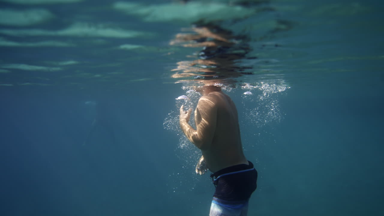 Man snorkeling underwater