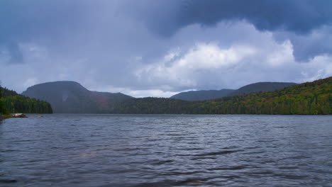 timelapse of a lake with incoming storm