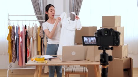 fashion vlogger reviews a new dress