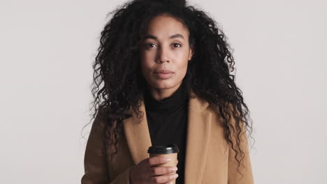 African-american-woman-in-of-camera-on-white-background.