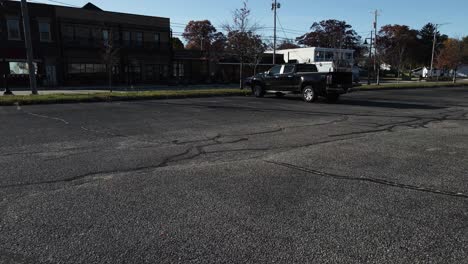 drone over a blacktop parking lot