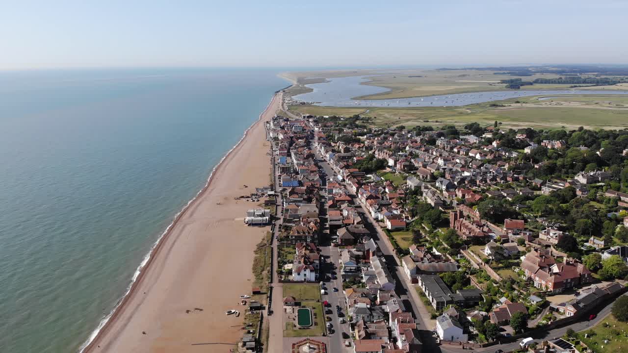 Revealing drone shot showing the sea front at Aldeburgh, Suffolk, UK. 21.06.25