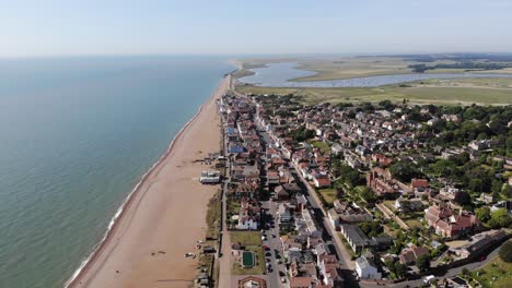 revealing drone shot showing the sea front at aldeburgh, suffolk, uk. 21.06.25