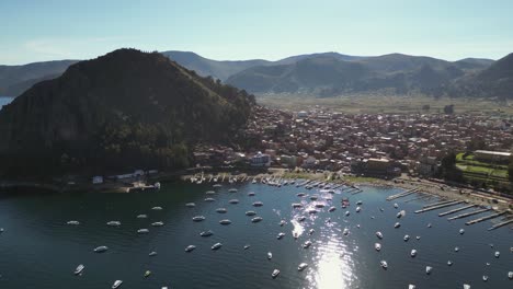 aerial: high altitude city of copacabana bolivia on lake titicaca