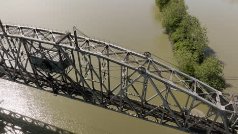 Bridge-Over-Arkansas-River-Near-Lee-Creek-Park-In-Van-Buren,-AR,-USA---aerial-drone-shot