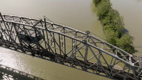 bridge over arkansas river near lee creek park in van buren, ar, usa - aerial drone shot