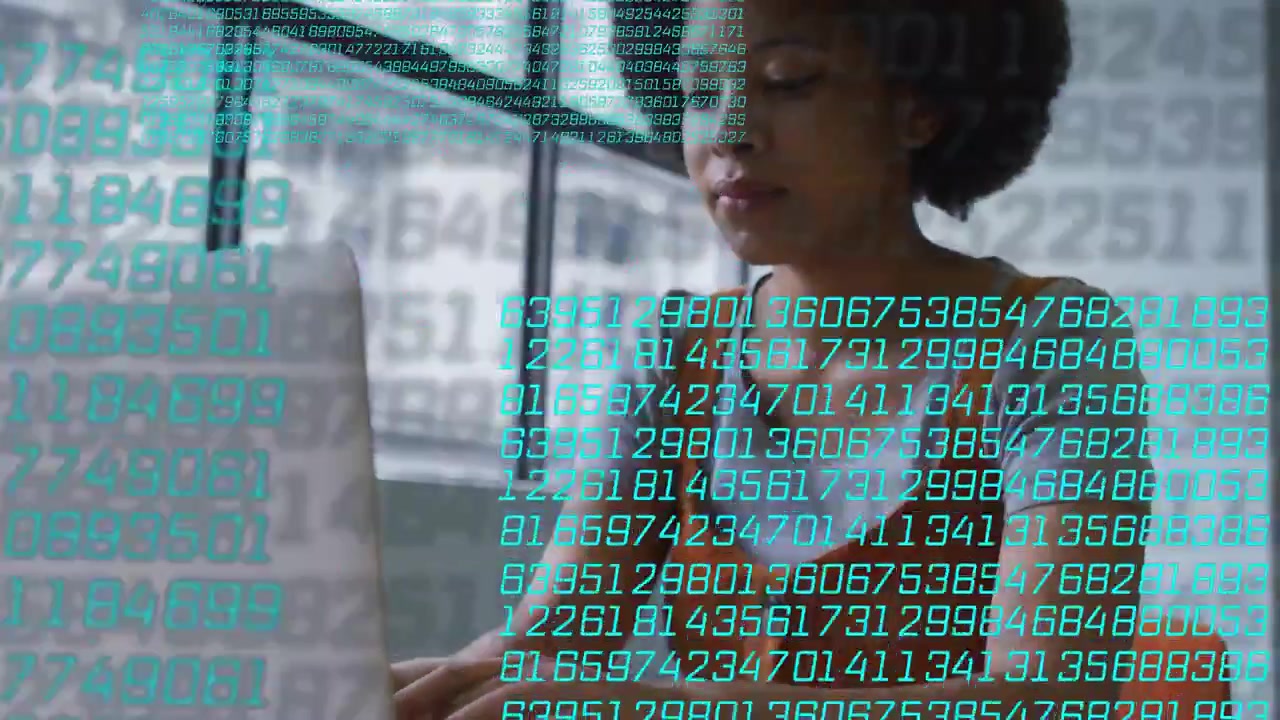 Woman typing on laptop, initiating teal digit overlay, leaning in and analyzing data for technology