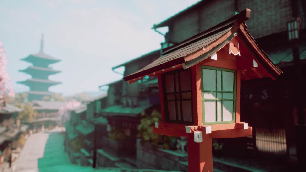 una linterna japonesa tradicional en una calle serena con una pagoda en el fondo