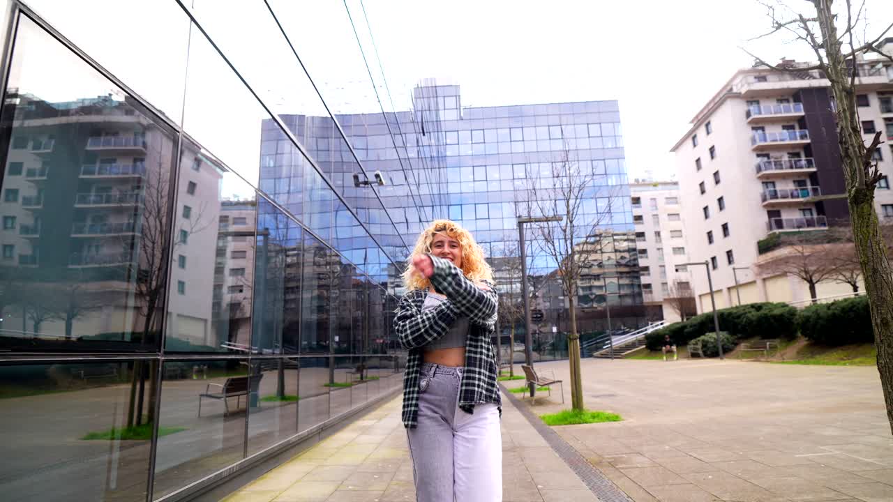 Woman dancing in an urban environment