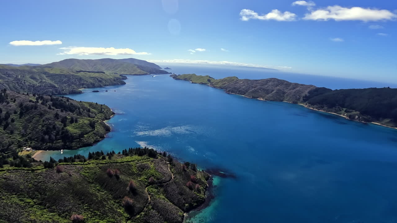 Flying over the Marlborough sounds with the interislander Ferry and the north island visible in the distance