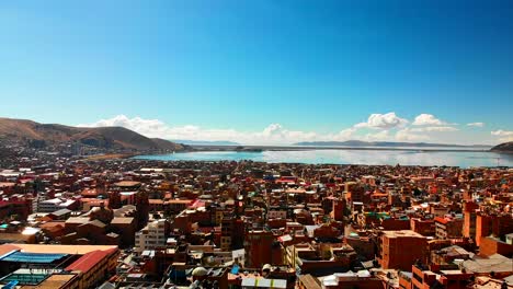 lake titicaca town puno, highest lake in the world, lago titicaca, large freshwater lake in the andes mountains on the border of bolivia and peru,the highest navigable lake in the world, monomictic