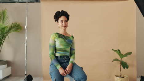 photo shoot of a young woman in a studio