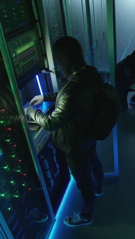 hackers in a server room