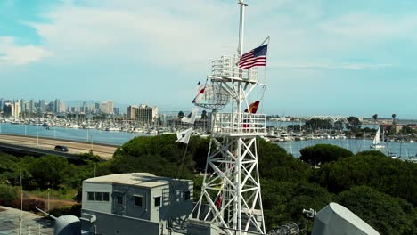 american flag in wind on the uss recuit