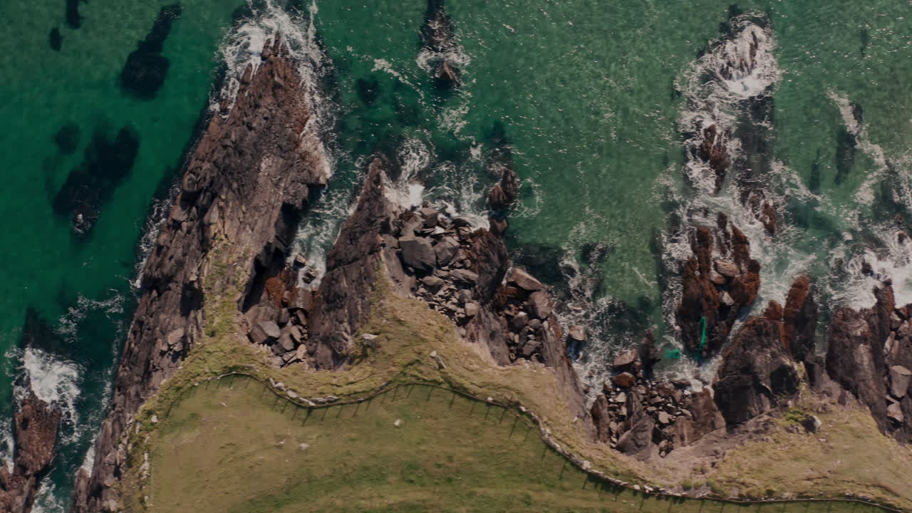 Coastal Aerial View of Rocks and Waves