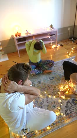 family yoga session with baby