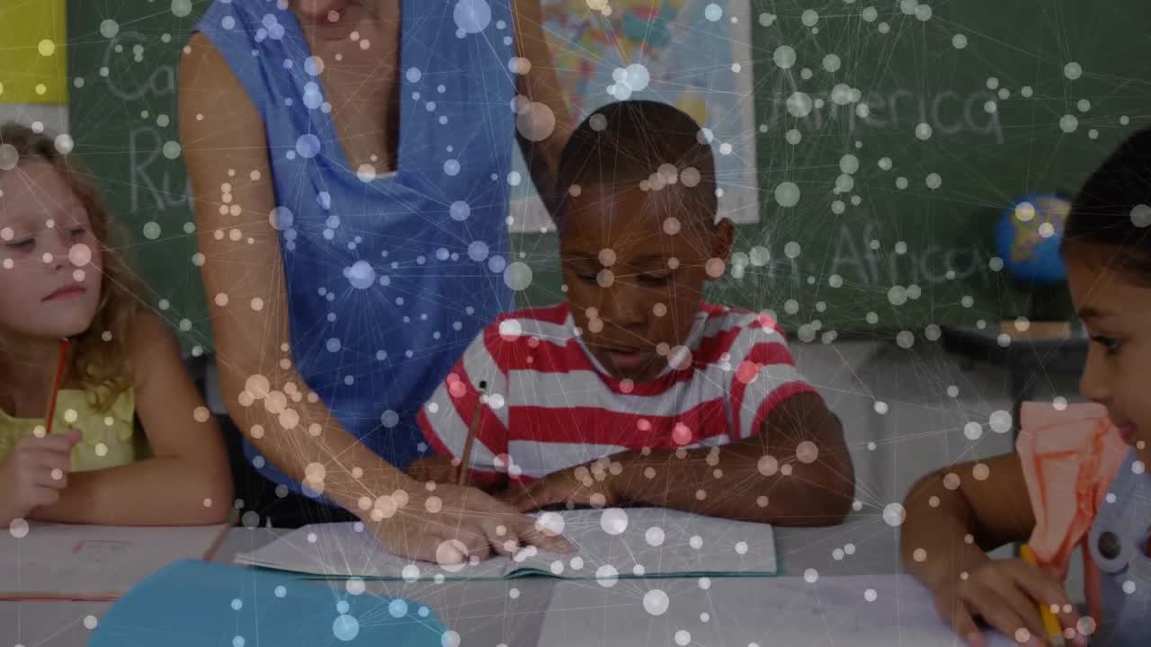 female teacher guiding student writing at desk in classroom, with floating globe and pencil icons