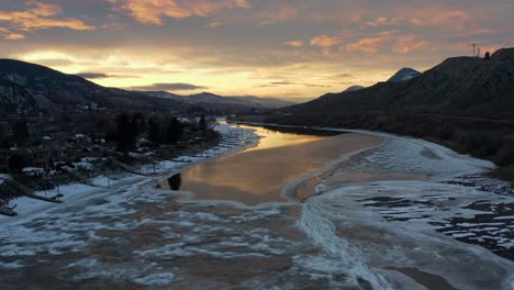 Reversed-Aerial-Journey-over-Thompson-River-and-Majestic-Sunset