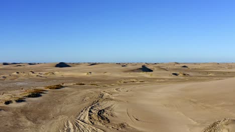 scenic view of sand dunes and arid desert terrain near cabo san lucas, mexico