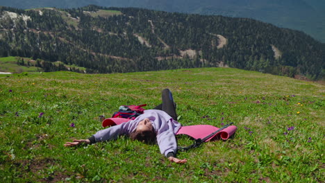 woman relaxing in the mountains