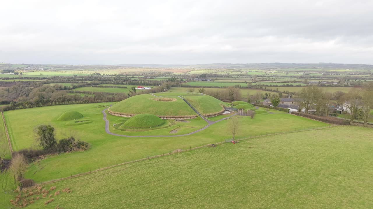 Flying Towards The Knowth, Prehistoric Tomb In County Meath, Ireland. - aerial shot