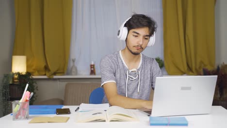 satisfied male student at pc.